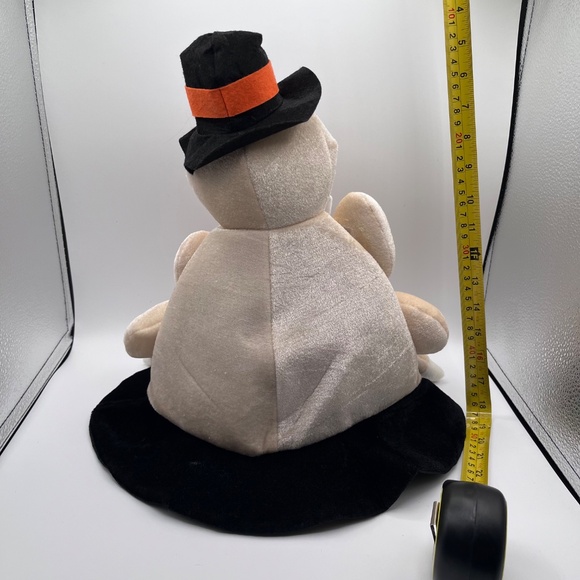 Thanksgiving turkey hat holding cutlery - Picture 2 of 4